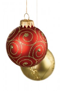 two red and gold christmas ball ornaments isolated on white
