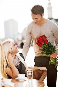 Man giving his girlfriend a bouquet of roses for Valentine's day. [url=https://www.istockphoto.com/search/lightbox/9786786][img]https://dl.dropbox.com/u/40117171/couples.jpg[/img][/url]