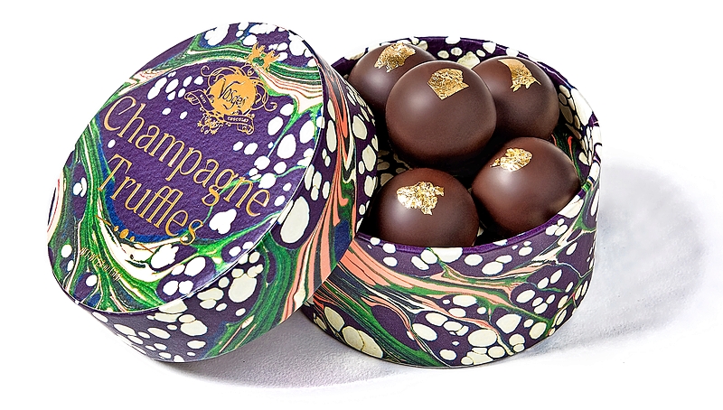 Limited-edition hand-rolled Champagne, dark chocolate, and gold-leaf truffles