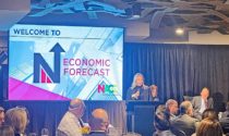 Christina Caton-Kitchel, Naperville Area Chamber of Commerce board chair, speaks at the chamber’s 15th annual economic forecast.