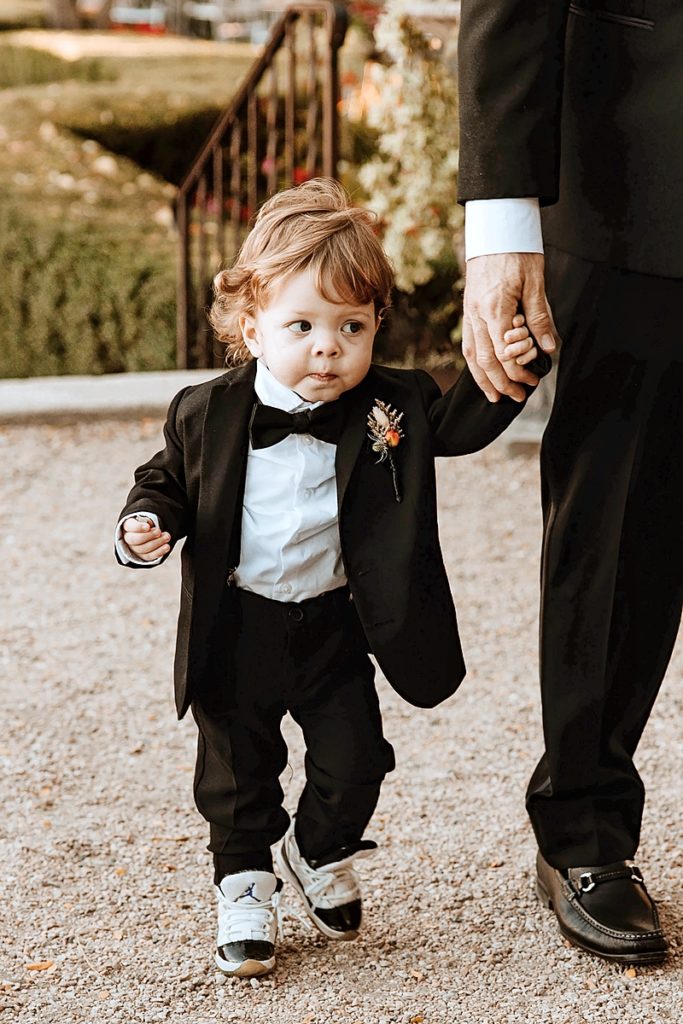 A little boy in a tuxedo