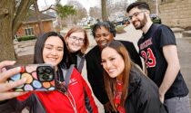 On March 21 Anita Thomas (with students) was named president of North Central College, making her the 11th in its 162-year history.