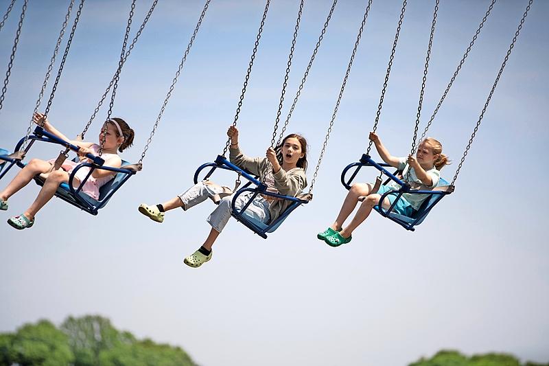 Kids on a swinging ride at Indiana Beach