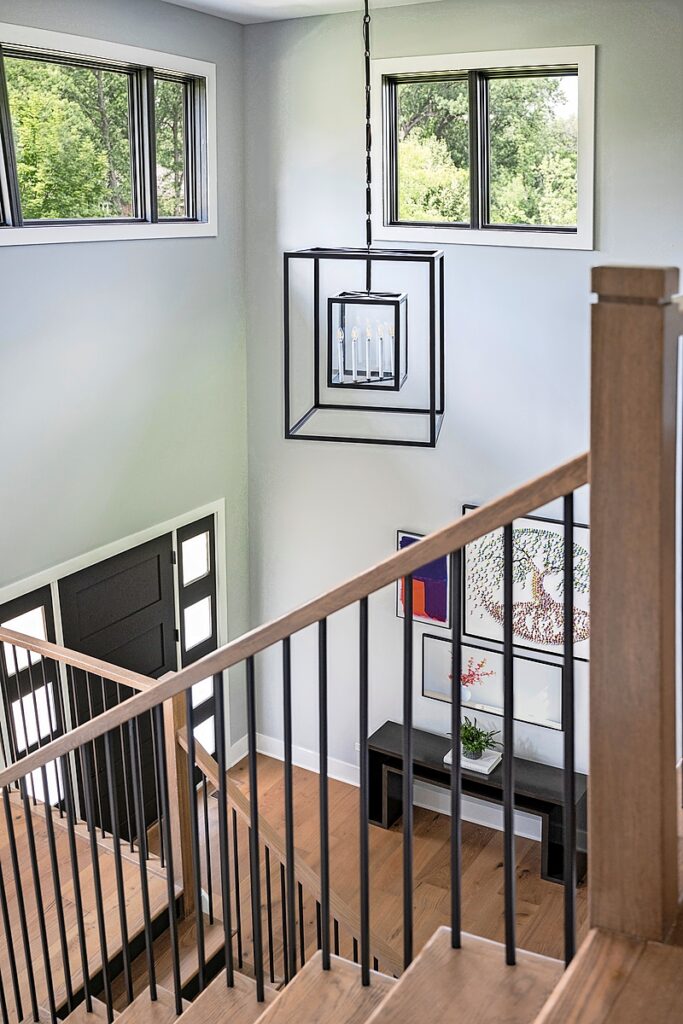 The light fixture and stairway in the Lemont home