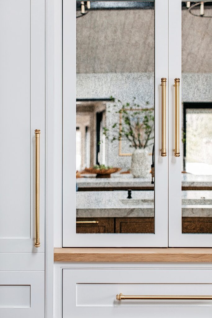 Mirrored pantry doors in the kitchen in the Downers Grove home