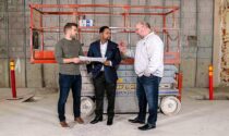 Construction is underway for the new 98-seat Stolp Island Theatre (5 W. Downer Pl., Aurora). From left, project manager Creg Sclavi, Aurora mayor Richard C. Irvin, and Paramount president and CEO Tim Rater go over plans for the live-performance venue slated to open this summer.