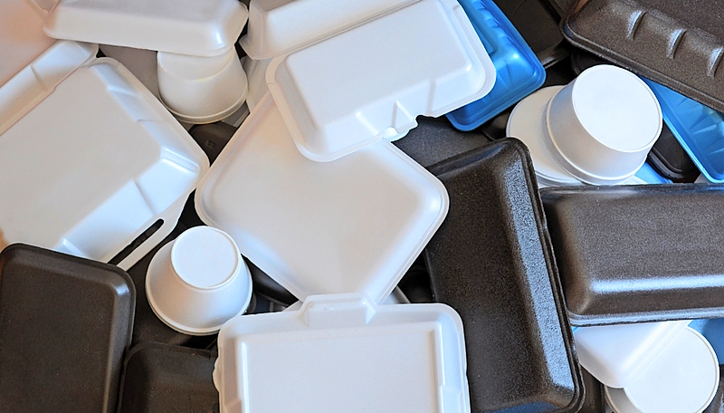 Top view of a stack of polystyrene containers.