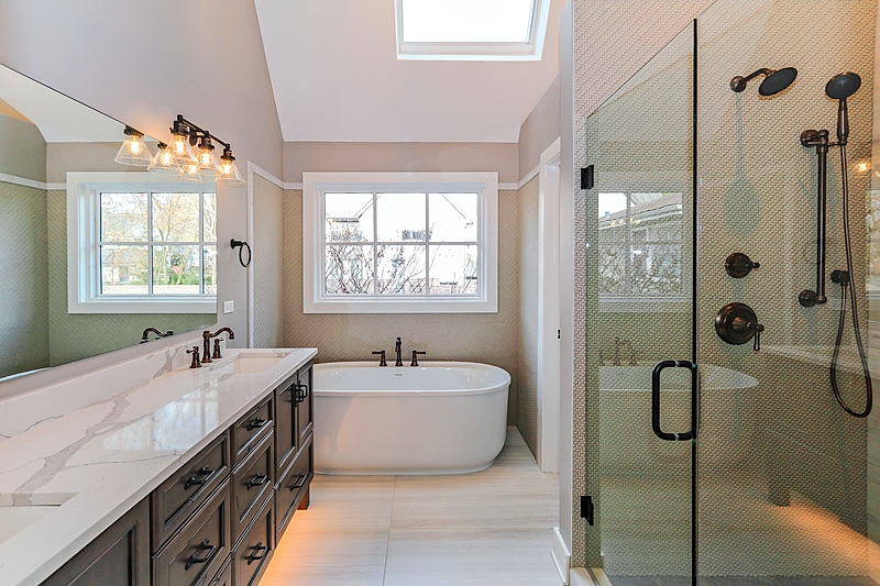 The vaulted ceiling and skylight in the home's bathroom