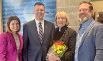At the annual State of Naperville Real Estate program March 6, retiring Christine Jeffries (center) was honored for her 27 years as president of the Naperville Development Partnership. Also pictured, left to right, are Kaylin Risvold, president and CEO of the Naperville Area Chamber of Commerce; Mayor Scott Wehrli; and John Koranda, vice president of commercial real estate for Wintrust Financial Corporation.