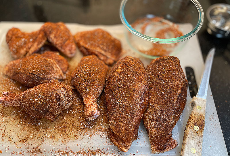 Seasoning the chicken