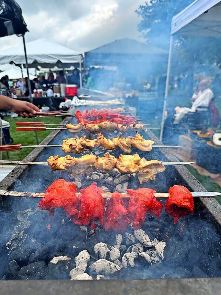 Food on the grill at Halal Fest