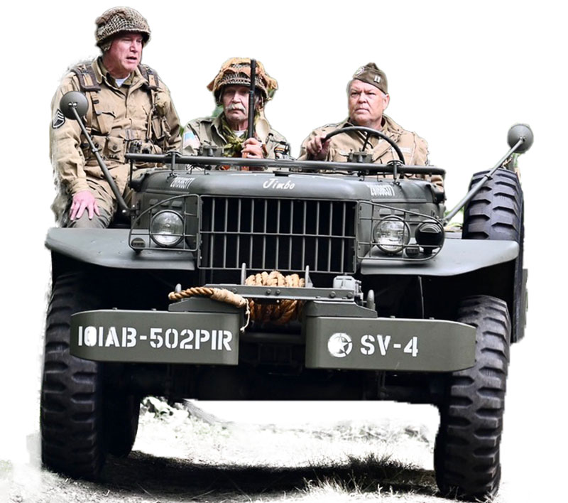 Three men in an military truck