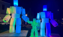 Downtown Aurora’s inaugural illuminated art experience includes Barrel Boy and Family. The interactive works are on display through November 1.