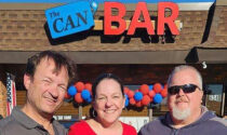 Owners (from left) Matt Rocush, Sandy Rocush, and Rod Peterson outside The Can