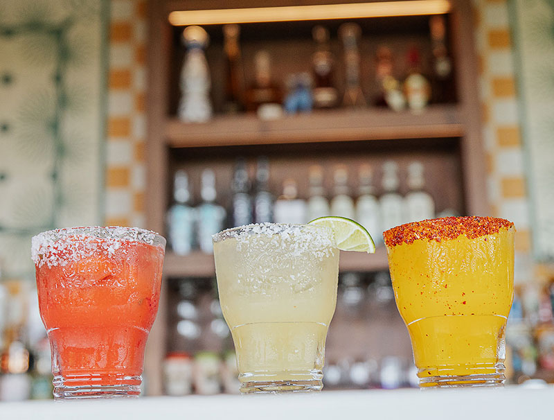 Strawberry jalapeño, De La Casa, and mango margaritas