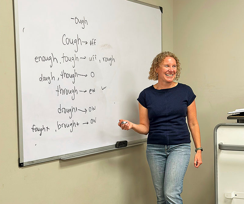 Jamie Schluckebier facilitates a conversation group at Naperville’s Nichols Library.
