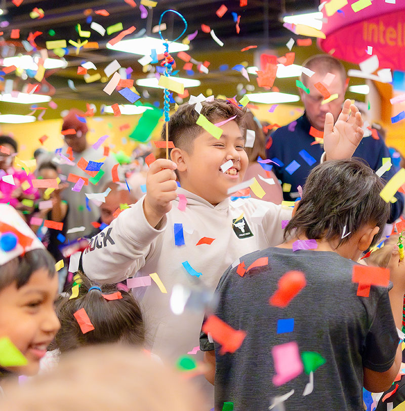 Kids celebrating at DuPage Children's Museum