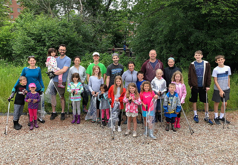 A river cleanup event—one of the Inside Out Club’s volunteer opportunities