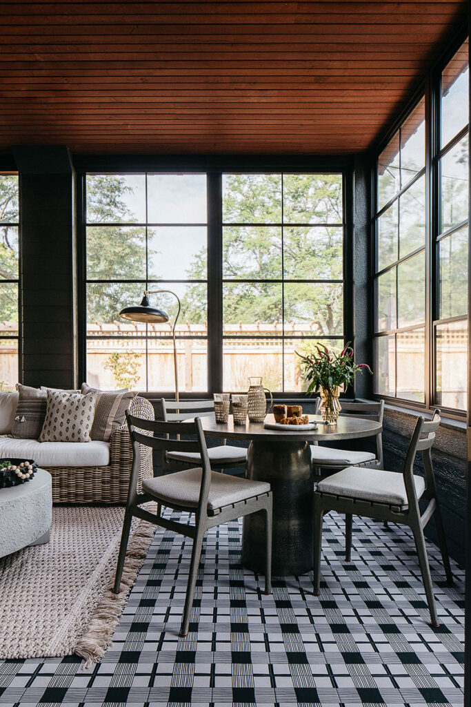 The furnished sunroom in the Geneva home