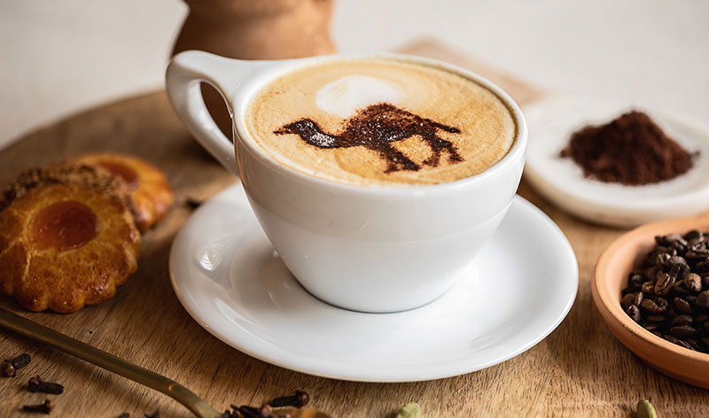 A cup of coffee with a camel in the foam from Arwa Yemeni Coffee