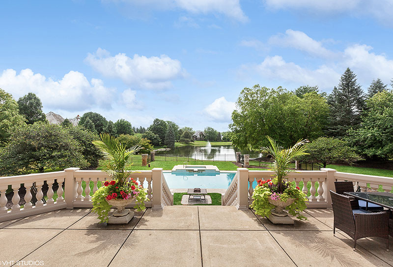 The pool area outside the St. Charles home