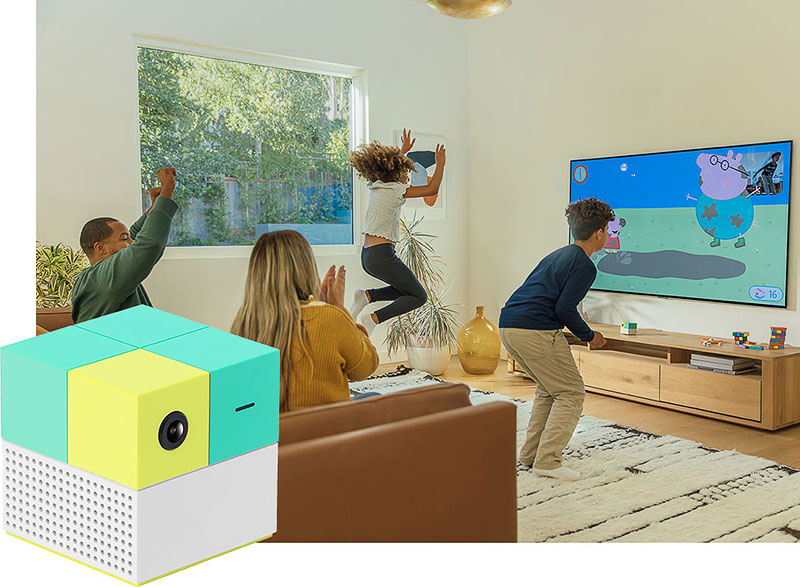 The Nex Playground cube, and a family playing games on their TV