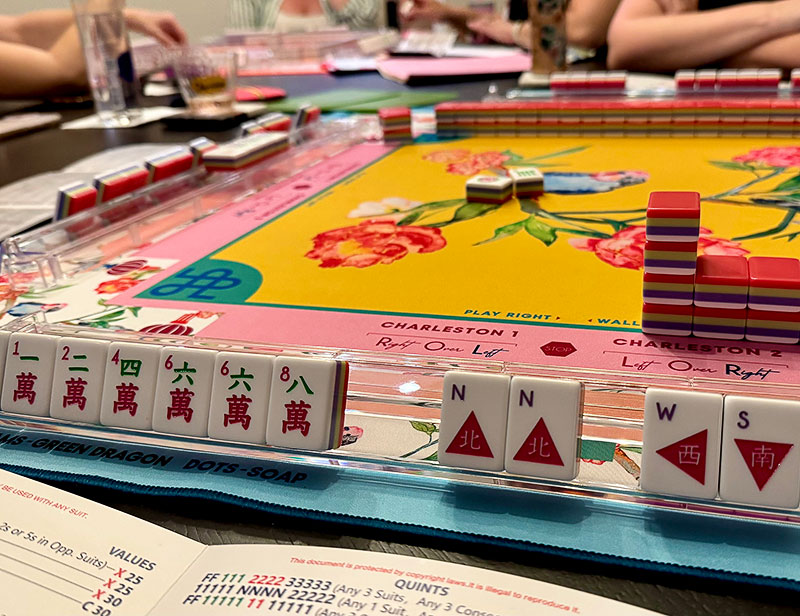A mahjong board and tiles