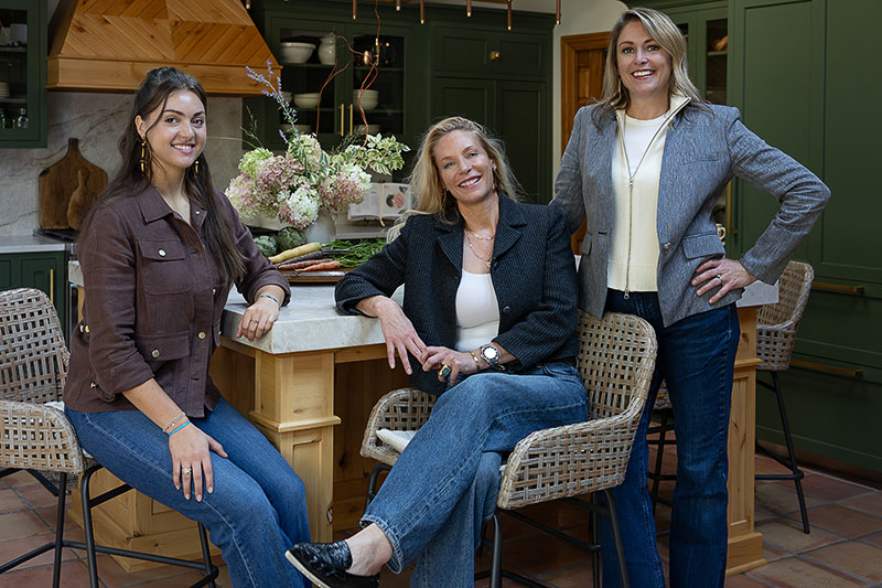 Marketing and creative coordinator Madison Bartuch, interior designer Christie Hines, and April Katsafanas