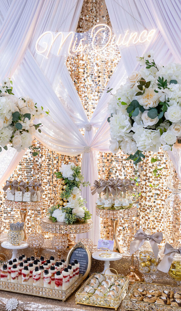 An elaborate sweets table by Claudia’s Sweets