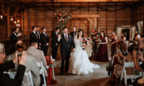 Romina Lara and Alexander Liddle with their wedding party and guests at their wedding