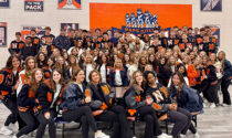 The Naperville North class of 2026 honored the Huskie legacy March 1 by closing the Huskie Runway fashion show with students wearing nearly 100 donated vintage varsity letterman jackets, each with its own connection to the school community. The 25th annual event was a fundraiser for Naperville North Boosters club.