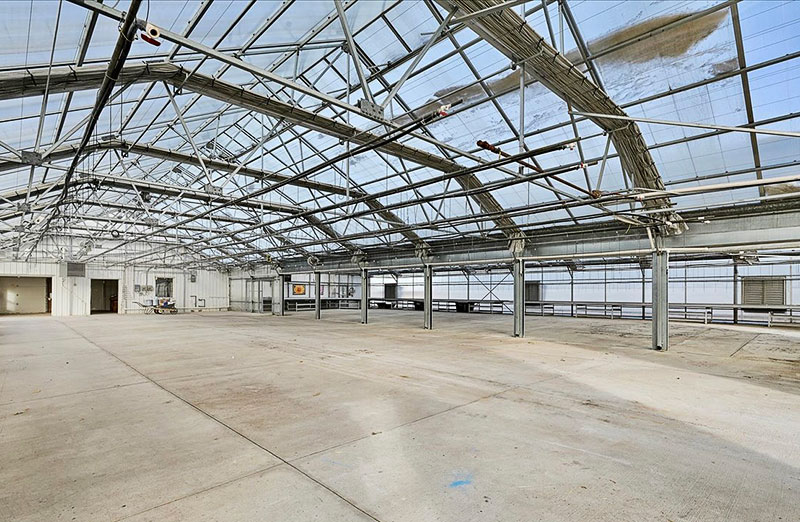 An empty greenhouse at 14132 Church Road in Minooka
