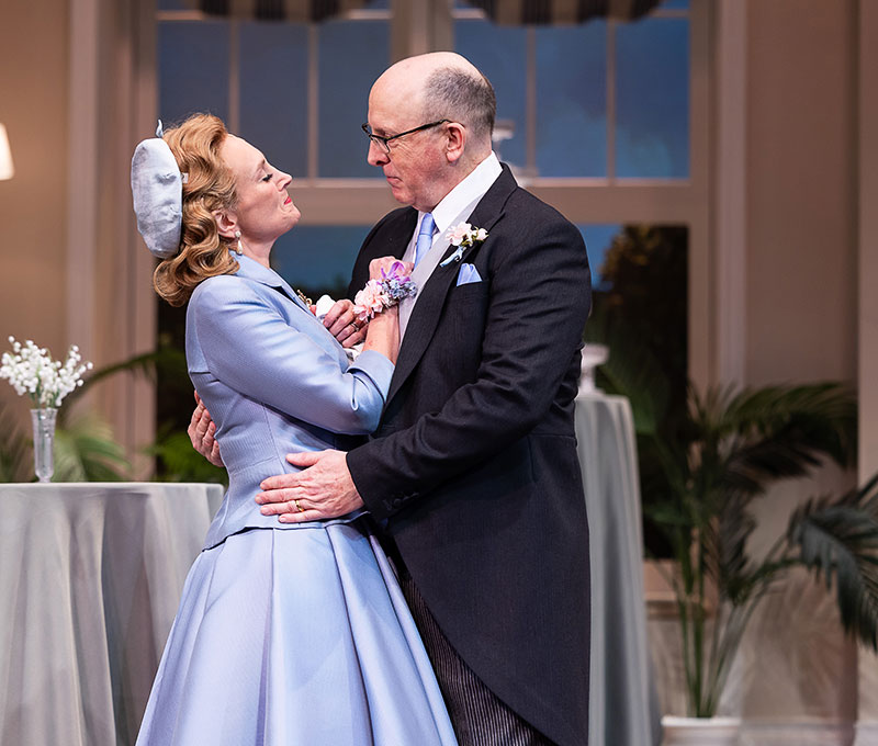 Rachel Sullivan as Mrs. Banks and her co-star as Mr. Banks in ‘Father of the Bride’