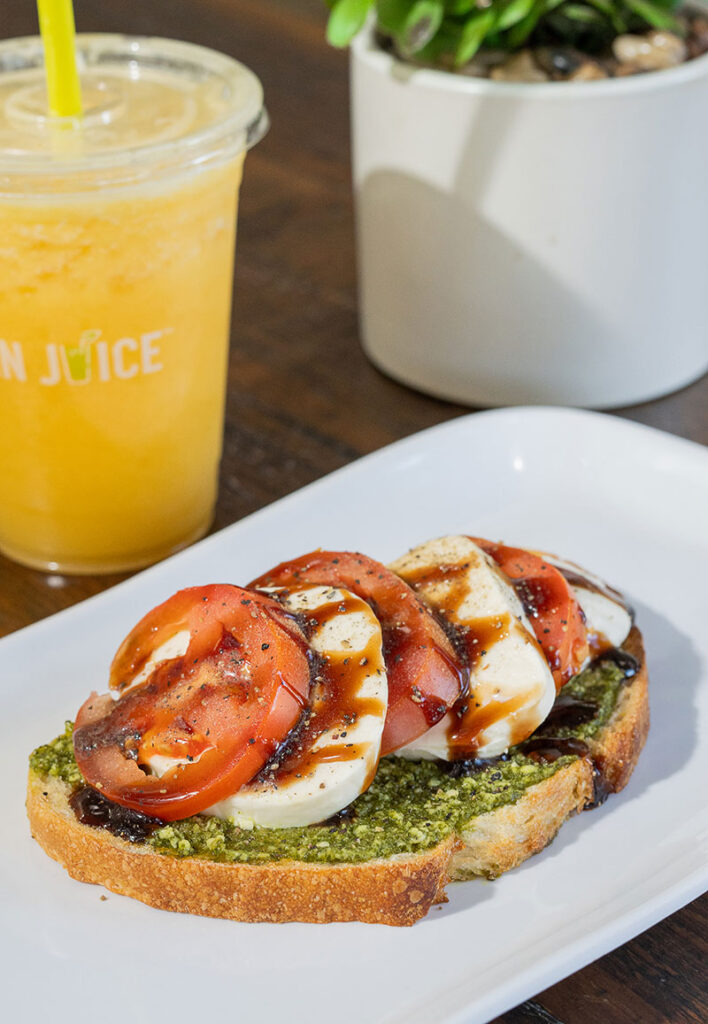 The caprese toast with pesto, Roma tomatoes, and mozzarella at Clean Juice in Naperville
