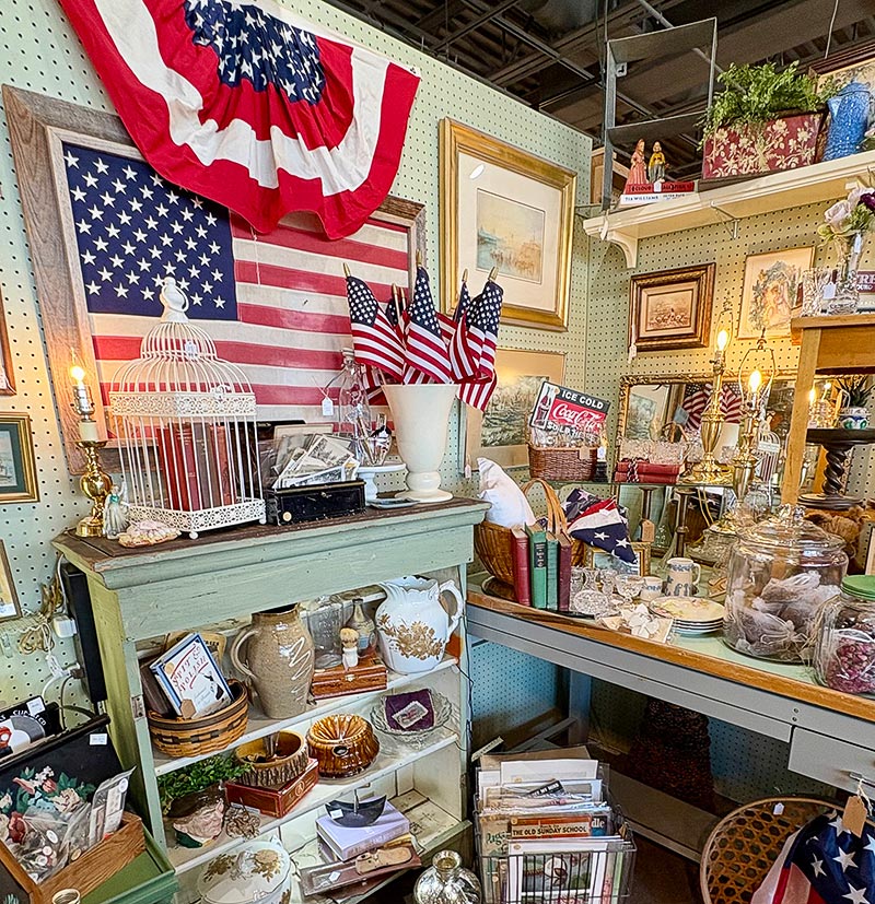 Various U.S. flag–themed items on display at Affordable Antiques & More
